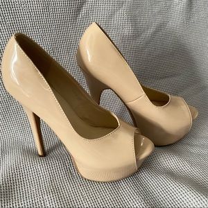 Nude peep toe heels. Size 8.